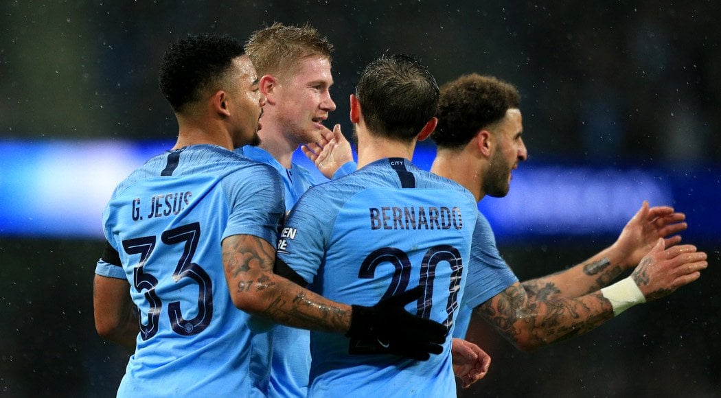 city boss pep guardiola labelled talk of a quadruple as quot fantasy quot earlier in the week but after cruising into the league cup final in midweek the english champions are in contention for a clean sweep of trophies photo afp