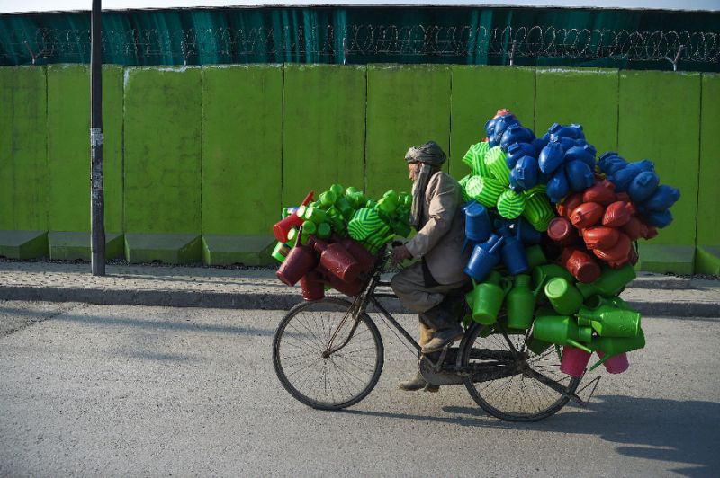 taliban are widely believed to want to return to power and reimpose their own strict interpretation of sharia law photo afp