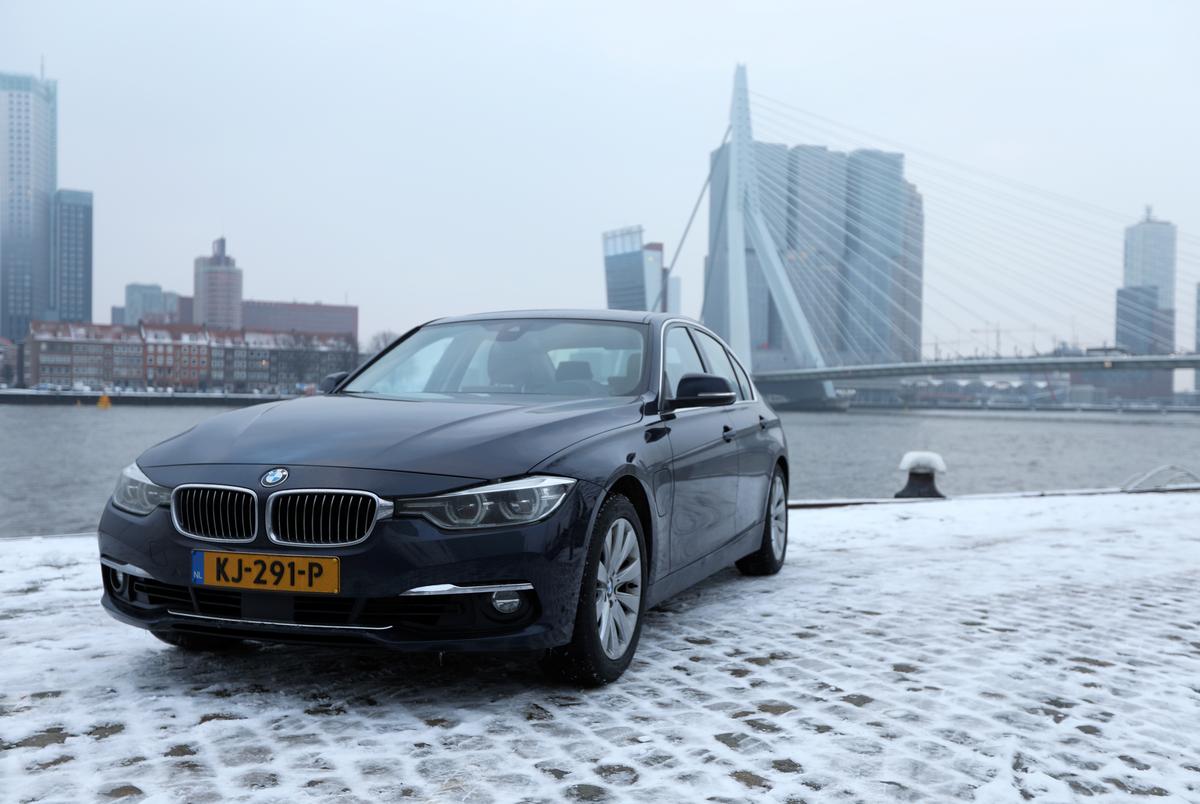 seeking thrifty ways to cut pollution rotterdam links up with hybrid bmw owners photo reuters
