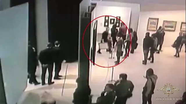 an image grab taken from a video footage released by the russian interior ministry on january 28 2018 shows a man stealing a famous painting by arkhip kuindzh during an exhibition at the tretyakov gallery in moscow on january 27 2018 photo afp an image grab taken from a video footage released by the russian interior ministry on january 28 2018 shows a man stealing a famous painting by arkhip kuindzh during an exhibition at the tretyakov gallery in moscow on january 27 2018 photo afp