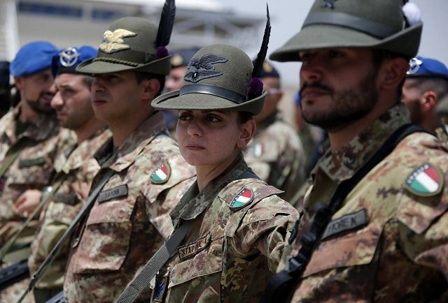 italian armed force soldiers of the mountain unit alpini stand in line at the herat airfield photo reuters italian armed force soldiers of the mountain unit alpini stand in line at the herat airfield photo reuters