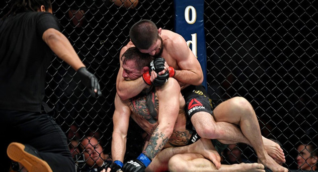 the scuffles immediately dwarfed the title fight that was one of the most lucrative in ufc history photo afp the scuffles immediately dwarfed the title fight that was one of the most lucrative in ufc history photo afp