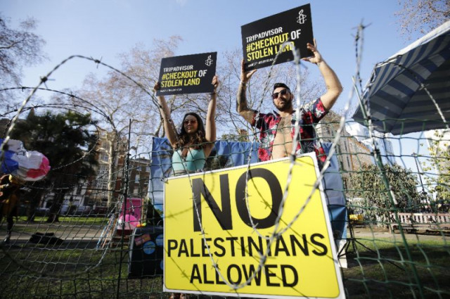 rights group amnesty international stages a demonstration outside the uk headquarters of us travel company tripadvisor in london photo afp rights group amnesty international stages a demonstration outside the uk headquarters of us travel company tripadvisor in london photo afp