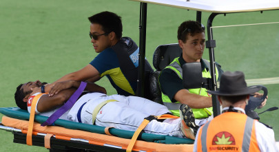 karunaratne stretchered off as sri lanka chase big australia total karunaratne stretchered off as sri lanka chase big australia total