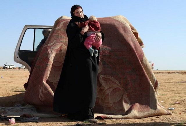 leonora a 19 year old german national who married into the islamic state group awaits screening and registration by the syrian democratic forces photo afp