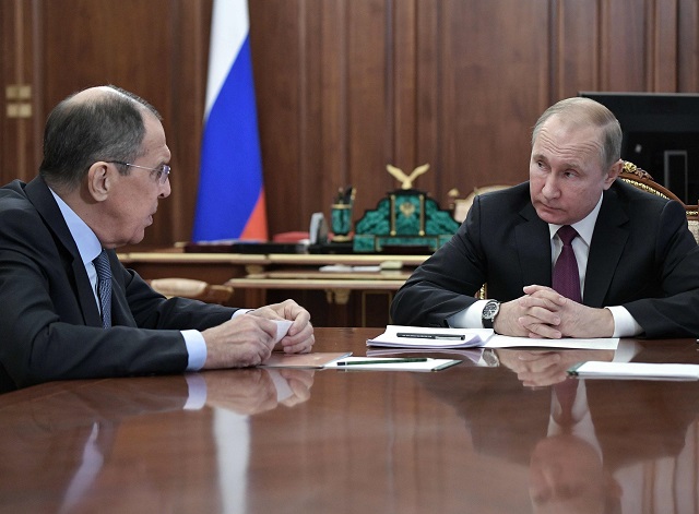 russia 039 s president vladimir putin r attends a meeting with russia 039 s foreign minister sergei lavrov l and russia 039 s defence minister in moscow on february 2 2019 photo afp