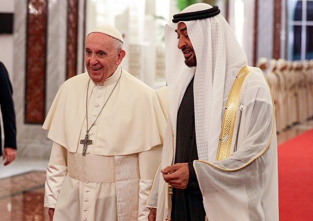 pope francis is welcomed by abu dhabi 039 s crown prince sheikh mohammed bin zayed al nahyan upon his arrival at abu dhabi photo afp