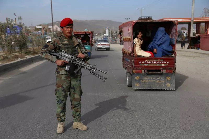 an afghan security personnel keep watch at a checkpoint in ghazni photo afp an afghan security personnel keep watch at a checkpoint in ghazni photo afp