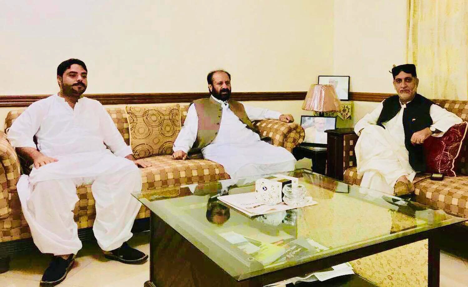 bnp m chief muhammad akhtar mengal in a meeting with pti leaders malik faisal khan kakar and atif sanjrani photo express file