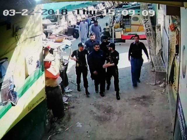 screengrab of cctv footage showing sultan zameen being taken into police custody