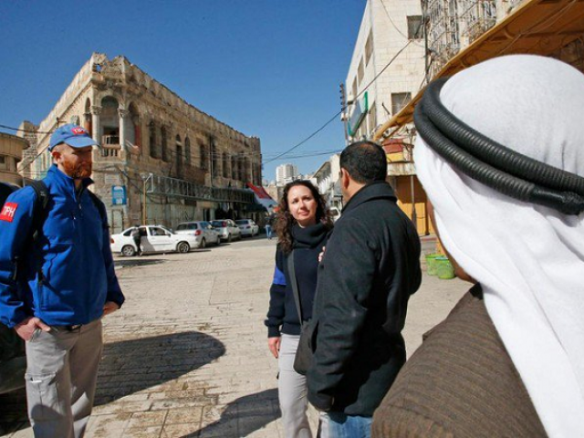 above members of the temporary international presence in hebron walk in the west bank city photo afp