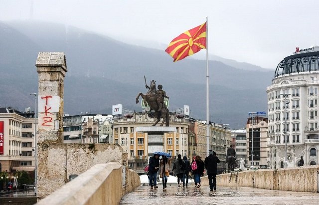 nato chief jens stoltenberg has said he looked forward to macedonia 039 s flag joining others in the alliance photo afp