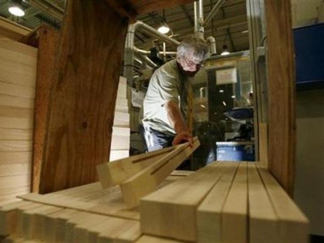 a worker at a furniture factory photo reuters