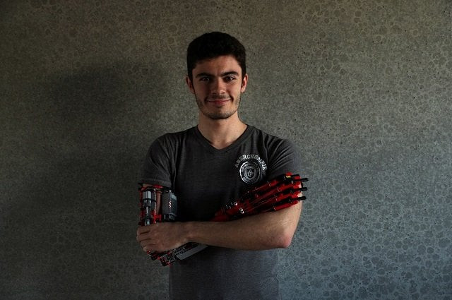 david aguliar poses with his prosthetic arm built with lego pieces photo reuters david aguliar poses with his prosthetic arm built with lego pieces photo reuters