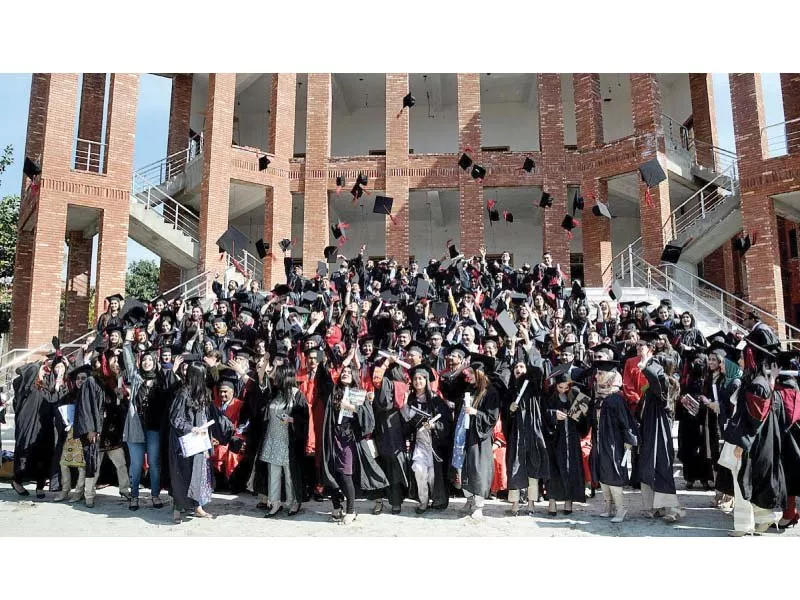 new medical graduates throw their hats in the traditional manner after passing out at the convocation of rawalpindi medical university institute of allied health sciences photo app new medical graduates throw their hats in the traditional manner after passing out at the convocation of rawalpindi medical university institute of allied health sciences photo app