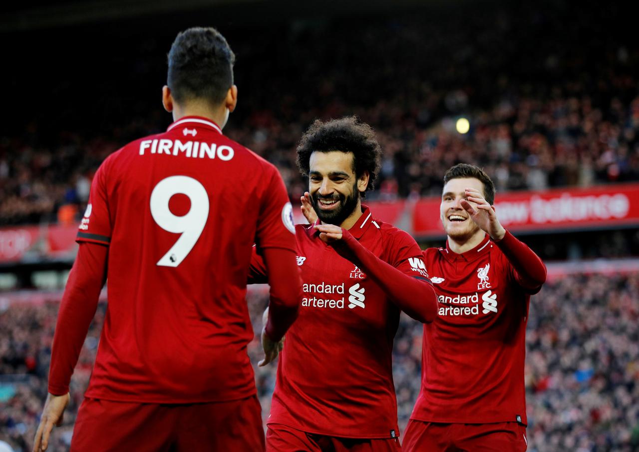 goals by sadio mane and georginio wijnaldum before the break and another for mohamed salah three minutes after it allowed liverpool to finish the match in cruise control photo afp