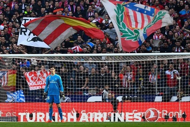 the belgium was whistled when he came out to warm up and then before kick off too as the atletico ultras behind the goal hurled dozens of toy rats towards his head a sign read 039 thibaut rata 039 just to underline the point photo afp the belgium was whistled when he came out to warm up and then before kick off too as the atletico ultras behind the goal hurled dozens of toy rats towards his head a sign read 039 thibaut rata 039 just to underline the point photo afp