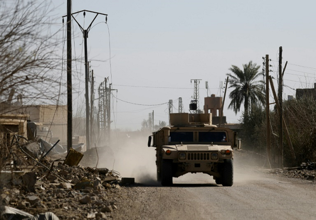 an armoured vehicle belonging to the us backed syrian democratic forces sdf near the front line village of baghouz in eastern syria on february 2 2019 photo afp an armoured vehicle belonging to the us backed syrian democratic forces sdf near the front line village of baghouz in eastern syria on february 2 2019 photo afp