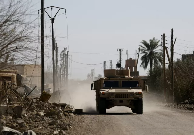 an armoured vehicle belonging to the us backed syrian democratic forces sdf near the front line village of baghouz in eastern syria on february 2 2019 photo afp an armoured vehicle belonging to the us backed syrian democratic forces sdf near the front line village of baghouz in eastern syria on february 2 2019 photo afp