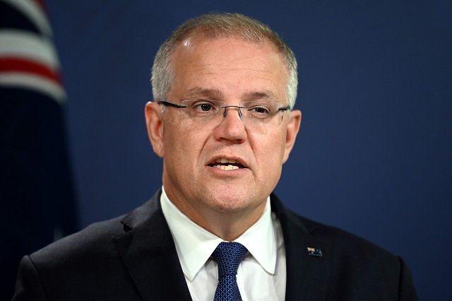 in this file photo taken on february 8 2019 australia 039 s prime minister scott morrison briefs the media about the flooding situation in queensland during a press conference in sydney   morrison fired the starter 039 s gun on his re election drive on february 11 promising to keep australians safe in a dangerous and sometimes 039 evil 039 world photo afp