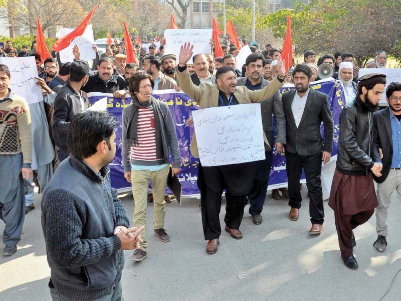 members of young doctors association yda protest outside benazir bhutto hospital in rawalpindi photo agha mehroze express