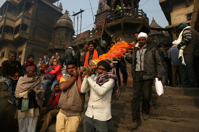 they arrive in battered cars on crutches and sometimes on a stretcher barely able to breathe    but salvation is close for thousands of hindus who go to the holy city of varanasi each year to die photo afp