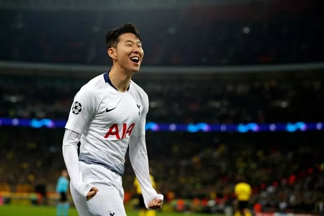 tottenham hotspur 039 s south korean striker son heung min celebrates after scoring the opening goal of the uefa champions league round of 16 first leg football match between tottenham hotspur and borussia dortmund at wembley stadium photo afp tottenham hotspur 039 s south korean striker son heung min celebrates after scoring the opening goal of the uefa champions league round of 16 first leg football match between tottenham hotspur and borussia dortmund at wembley stadium photo afp