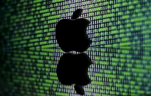 a 3d printed apple logo is seen in front of a displayed cyber code in this illustration taken march 22 2016 photo reuters a 3d printed apple logo is seen in front of a displayed cyber code in this illustration taken march 22 2016 photo reuters