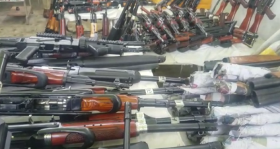 large cache of arms intercepted by k p police