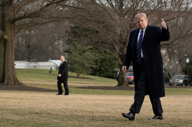us president donald trump gives a thumbs up as he returns to the white house after his annual physical exam on february 8 2019 photo afp