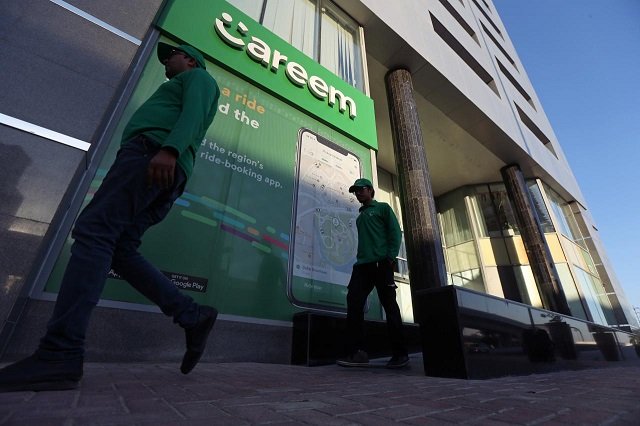 careem employees walk past the company headquarters in dubai uae december 13 2018 photo reuters