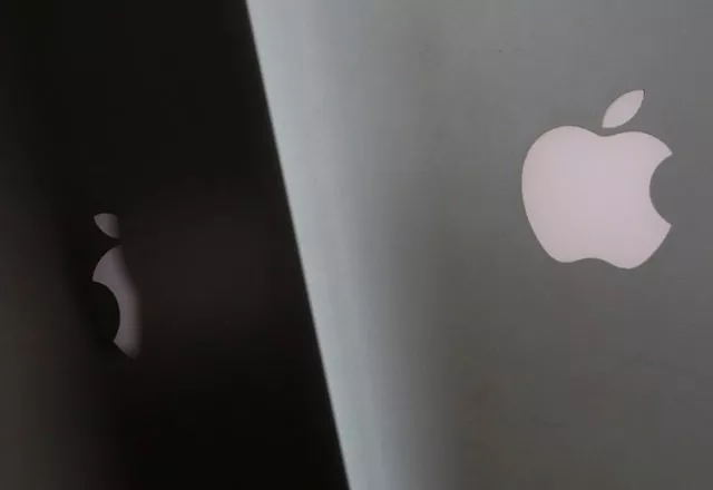 apple company logos are seen as two macbooks stand next to each other in an office in vienna austria january 3 2019 photo reuters apple company logos are seen as two macbooks stand next to each other in an office in vienna austria january 3 2019 photo reuters
