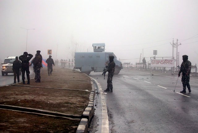 indian soldiers stand guard near the site of thursday 039 s suicide bomb attack in lethpora in occupied kashmir 039 s pulwama district february 15 2019 photo reuters