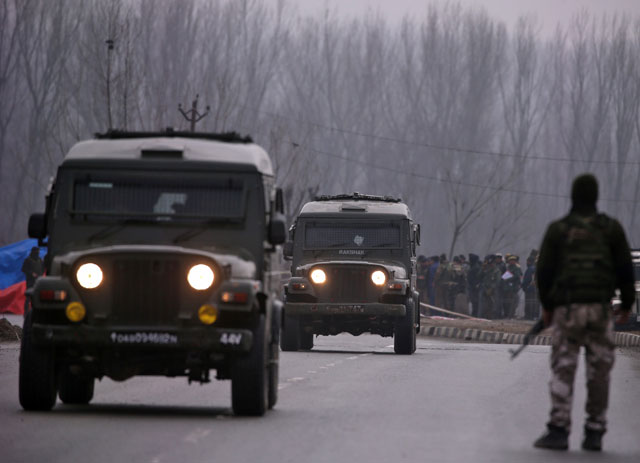 indian soldiers stand guard near the site of thursday 039 s suicide bomb attack in occupied kashmir s pulwama district february 15 2019 photo reuters