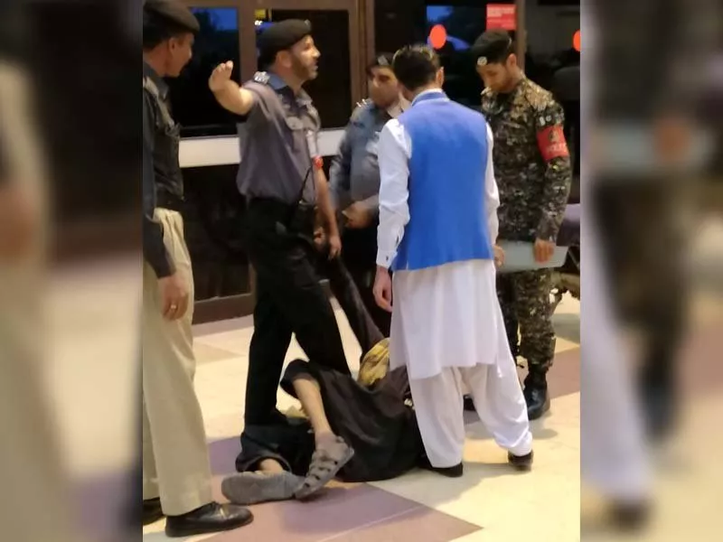 viral video shows man being wrestled to the ground by airport security screengrab viral video shows man being wrestled to the ground by airport security screengrab