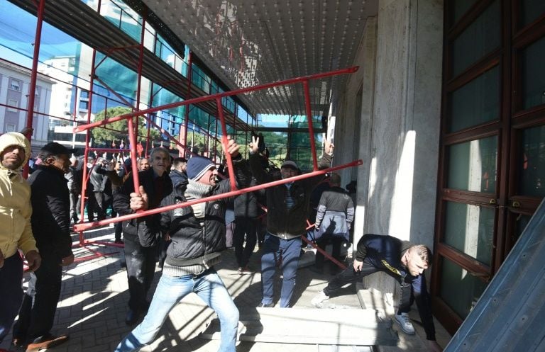 police and protesters clash outside albanian parliament