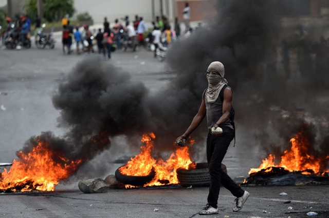 protests like this one in port au prince are aiming to get president jovenel moise   who faces allegations of widespread corruption   to resign photo afp