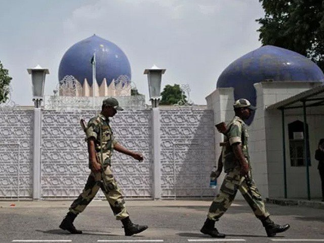 protesters were allowed to reach and jolt the gate of the pakistan house despite presence of indian security officials photo afp