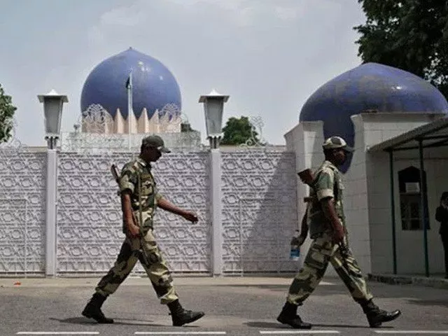 protesters were allowed to reach and jolt the gate of the pakistan house despite presence of indian security officials photo afp protesters were allowed to reach and jolt the gate of the pakistan house despite presence of indian security officials photo afp
