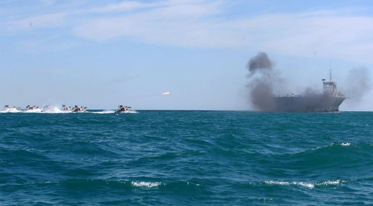 iran 039 s elite revolutionary guard attacks a vessel during a previous drill in the strait of hormuz in 2015 photo afp