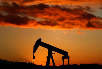 oil hovers near 2019 highs amid opec cuts