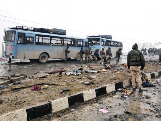 indian soldiers examine the debris after an explosion in occupied kashmir 039 s pulwama district on thursday photo reuters