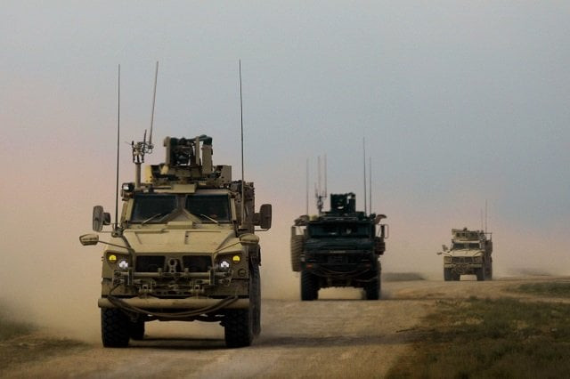military vehicles with the us backed coalition against the militant islamic state is group are pictured during an operation to expel the terrorists in the countryside of the eastern syrian province of deir ezzor on february 21 2019 photo afp military vehicles with the us backed coalition against the militant islamic state is group are pictured during an operation to expel the terrorists in the countryside of the eastern syrian province of deir ezzor on february 21 2019 photo afp