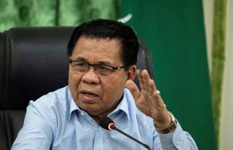 moro islamic liberation front chairman murad ebrahim gestures during a press conference on the southern philippine island of mindanao last month photo afp