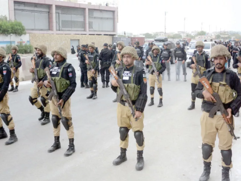 police commandos of the special security unit ssu march in front of the muharram 9 procession on ma jinnah road on tuesday photo jalal qureshi express police commandos of the special security unit ssu march in front of the muharram 9 procession on ma jinnah road on tuesday photo jalal qureshi express