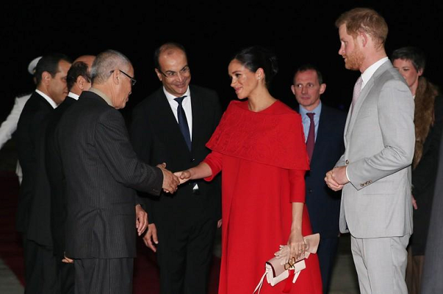 britain 039 s prince harry and meghan duchess of sussex are welcomed by officials at the casablanca airport in casablanca morocco february 23 2019 photo reuters