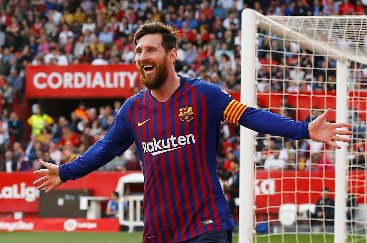 messi pledged his side would now go all out for a treble of la liga copa del rey and champions league trophies after he scored a remarkable 50th career hat trick in a rousing 4 2 win at sevilla in la liga on saturday photo reuters