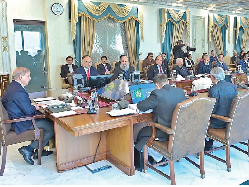 prime minister shehbaz sharif has a word with members of his cabinet during the meeting photo inp