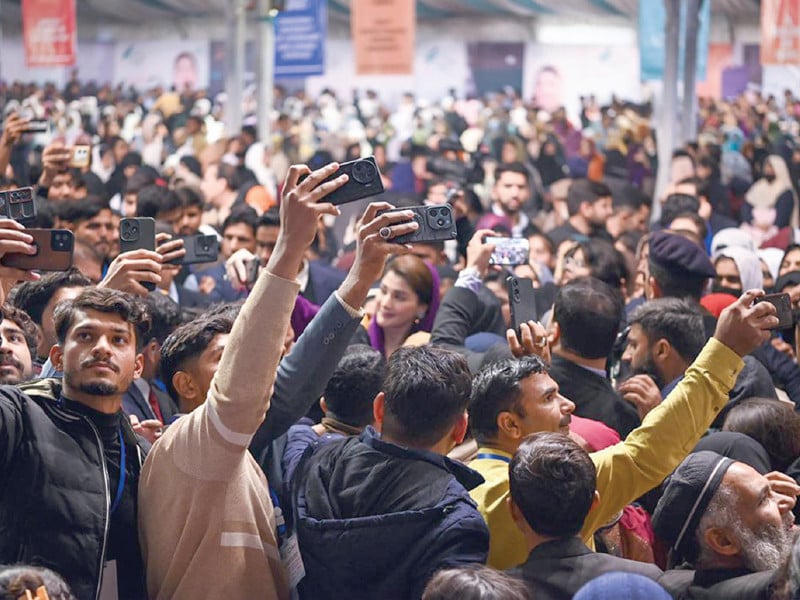 students click selfies with punjab chief minister maryam nawaz after a honhaar scholarship ceremony at islamia university bahawalpur photo express