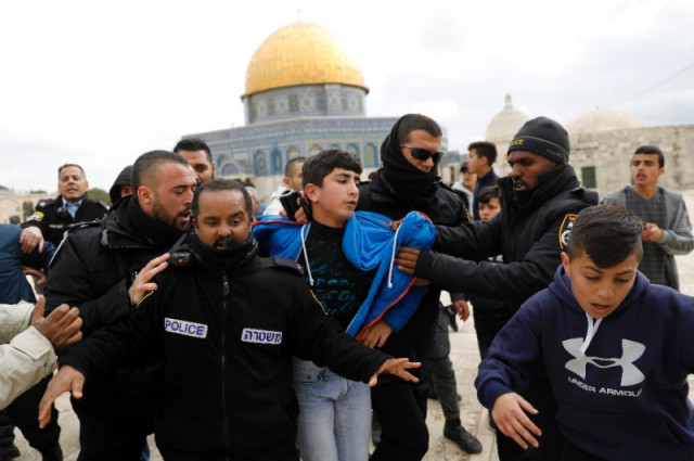 israeli policemen detain a young palestinian demonstrator during clashes after protesters tried to break the lock on a gate at the flashpoint al aqsa mosque compound in jerusalem on february 18 2019 after it was closed by israeli authorities photo reuters israeli policemen detain a young palestinian demonstrator during clashes after protesters tried to break the lock on a gate at the flashpoint al aqsa mosque compound in jerusalem on february 18 2019 after it was closed by israeli authorities photo reuters
